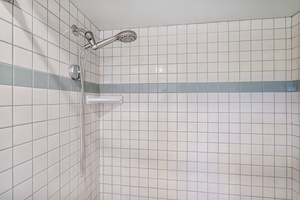 Refreshing walk-in shower in Room 3’s ensuite bathroom.