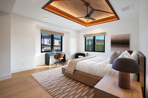 Light-filled guest suite with king bed, vaulted ceiling, and tranquil garden outlook for restful Kauai mornings.