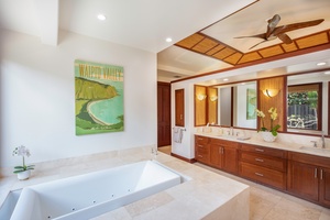 Marble bathroom with shower and jetted tub