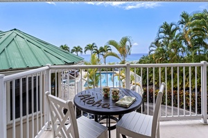 Sip your morning coffee on your private lanai overlooking tropical palms and sparkling pool views.