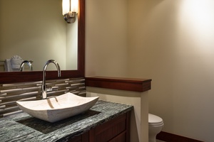 Powder room off great room.