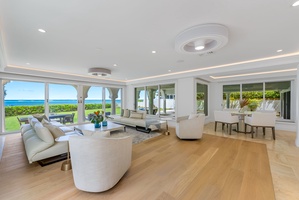 Coastal-inspired living area offering ocean views, natural light, and ample space for relaxation or conversation.