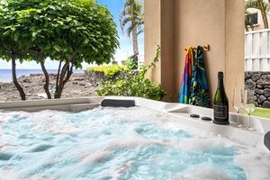 Unwind in your private hot tub with ocean views of the Kona coast.