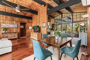 Your stylish open-plan living space has high ceilings, rich hardwood floors, and gorgeous views.