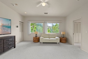 This light-filled sitting room offers a quiet space to read, relax, or enjoy a morning coffee in total peace.