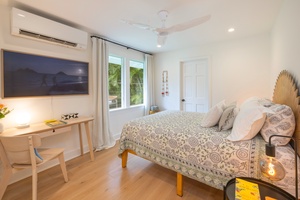 With wide windows, Smart TV, and split-type AC, this airy bedroom is designed for both restful sleep and modern comfort.