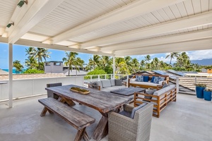 There's ample seating up here as well as a dining table.