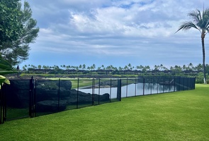 View of the pool & spa with a Child Safety fence that can be set up upon request (Set-up fee applies)