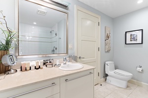 The ensuite bathroom at Wailea Hoolei 93-3 features ample vanity space for your convenience.