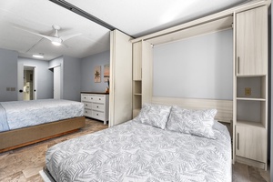 Bonus room setup with Murphy bed opened, ideal for overnight stays.