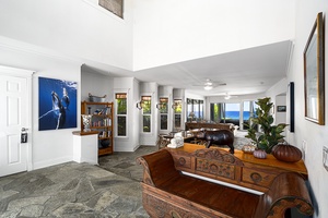 Grand main foyer welcomes guests with elegant coastal style and open flow.
