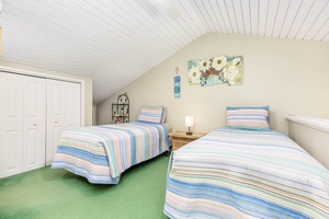 Loft bedroom has access to its ensuite bathroom.