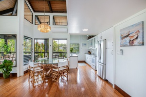 Dine together under vaulted ceilings with garden views and seamless indoor-outdoor flow.
