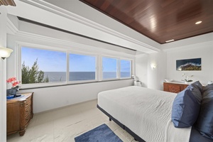 Wake up to breathtaking panoramic ocean views in this bright and airy suite.