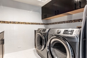 Your dedicated laundry room features modern appliances and stylish storage, making it easy to keep your wardrobe fresh during your stay.