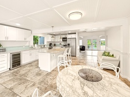 Your spacious open-plan kitchen flows into a bright living area, perfect for gathering with loved ones over home-cooked meals.