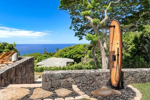 Outdoor shower with a view of the beautiful ocean.