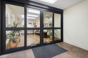 Secure entry with key-coded elevator access for peace of mind.
