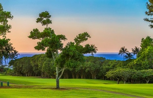 Ocean, golf course and sunset view from the lanai