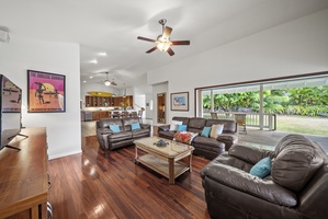 Lounge area on the lanai: cozy seating and tropical surrounds make it a peaceful retreat.