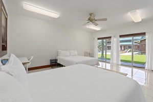 Comfortable guest bedroom with direct outdoor access.