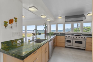 Cook with panoramic ocean views in your dream kitchen, where stunning sea vistas inspire every meal.