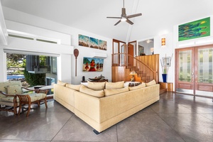 Comfort meets connection in this oceanview living space—perfect for relaxing after a Kona beach day.