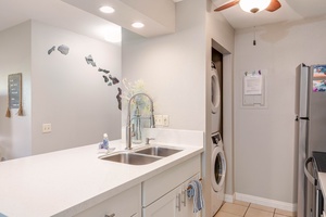 Washer and dryer conveniently located within the kitchen area.