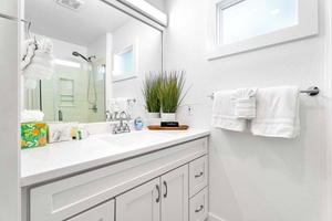 Junior Primary ensuite has a walk in shower and storage.