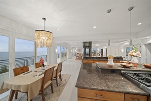 The breakfast nook adjacent to the kitchen has seating for four.