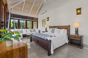 Beautiful view from the guest bedroom with comfortable bed and cozy seating area..