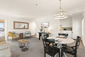 Enjoy shared meals or morning coffee in a breezy, sunlit dining space with four seats, designed for togetherness.
