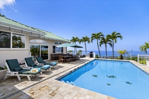 Private paradise with crystal-clear waters and ocean views stretching to the horizon from your poolside retreat.