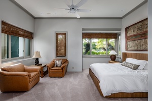 Spacious guest suite with sitting area and serene views — ideal for relaxing after a beach day.