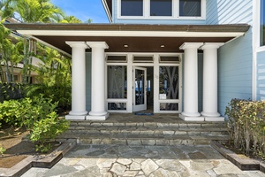 Grand front entry welcomes guests into this stunning oceanfront retreat.