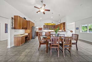 Dining area flows into the fully equipped kitchen for seamless group meals.