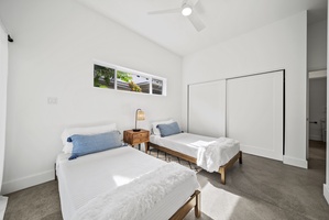 The bright and airy suite has a closet, ceiling fan, and ensuite bath for comfort.