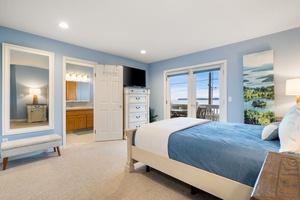 Drift off in your serene blue sanctuary with ocean views from your bed and convenient ensuite access.