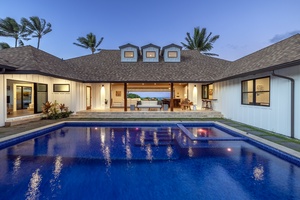 Twilight view of the pool  center