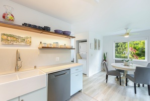 Convenient kitchen layout opens to the dining area, keeping everyone connected.