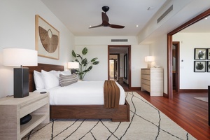 Alternate view of primary suite leading to ensuite bath.