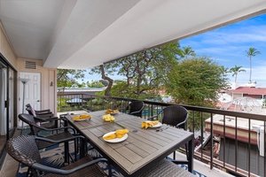 Tropical breezes carry island scents through swaying palms. Your outdoor dining table awaits morning coffee and sunset meals.