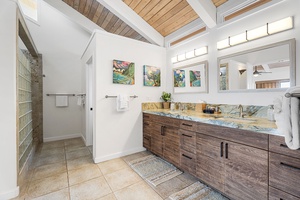 Start your day in a bright, spacious bathroom with a walk-in shower and clean design.