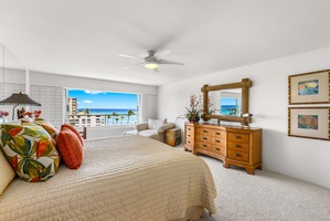 Spacious primary suite with panoramic views of Diamond Head and the coastline, offering a peaceful retreat to begin and end each day.