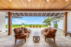 Retreat to luxury on the covered lanai overlooking Kailua Bay and the iconic Mokulua Islands.