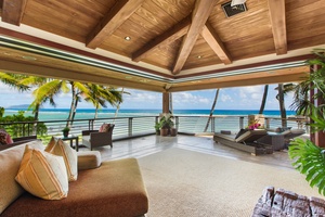 Wrap-around lanais surround the primary suite for immersive island living.