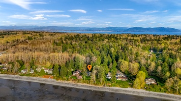 Tucked into nature, just steps from the shoreline—your peaceful retreat on Lummi Bay awaits.