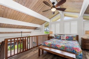 Unwind in a breezy lofted bedroom, a cozy retreat above it all.