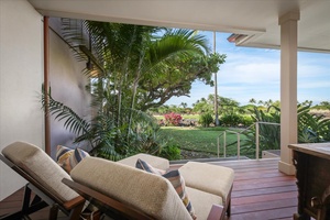 Relax on the private lanai with views of the golf course.