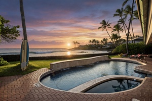 Soak in the spa at sunset, with ocean views and warm light all around.